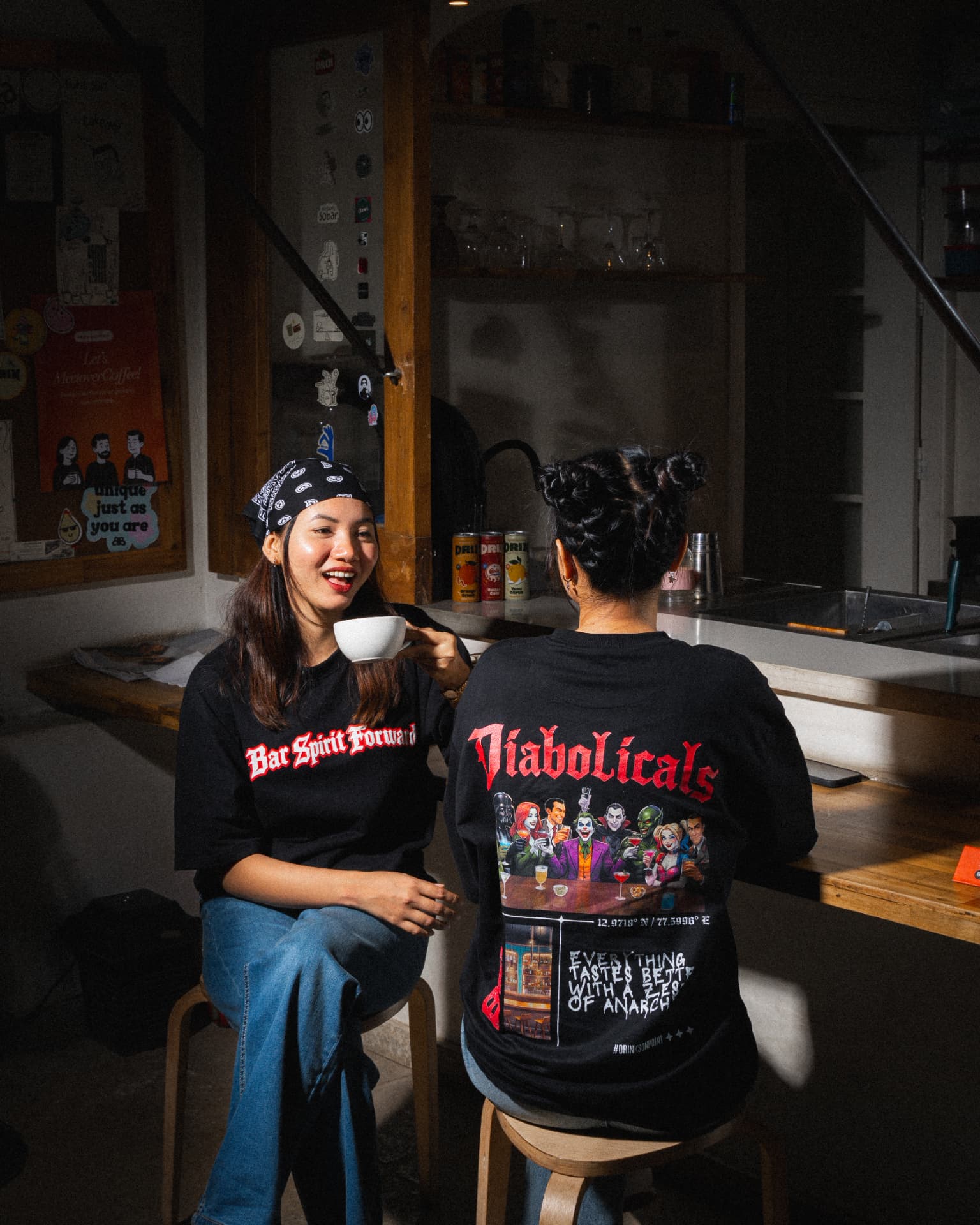 Diabolicals and Bar Spirit Forward tees at the cafe counter