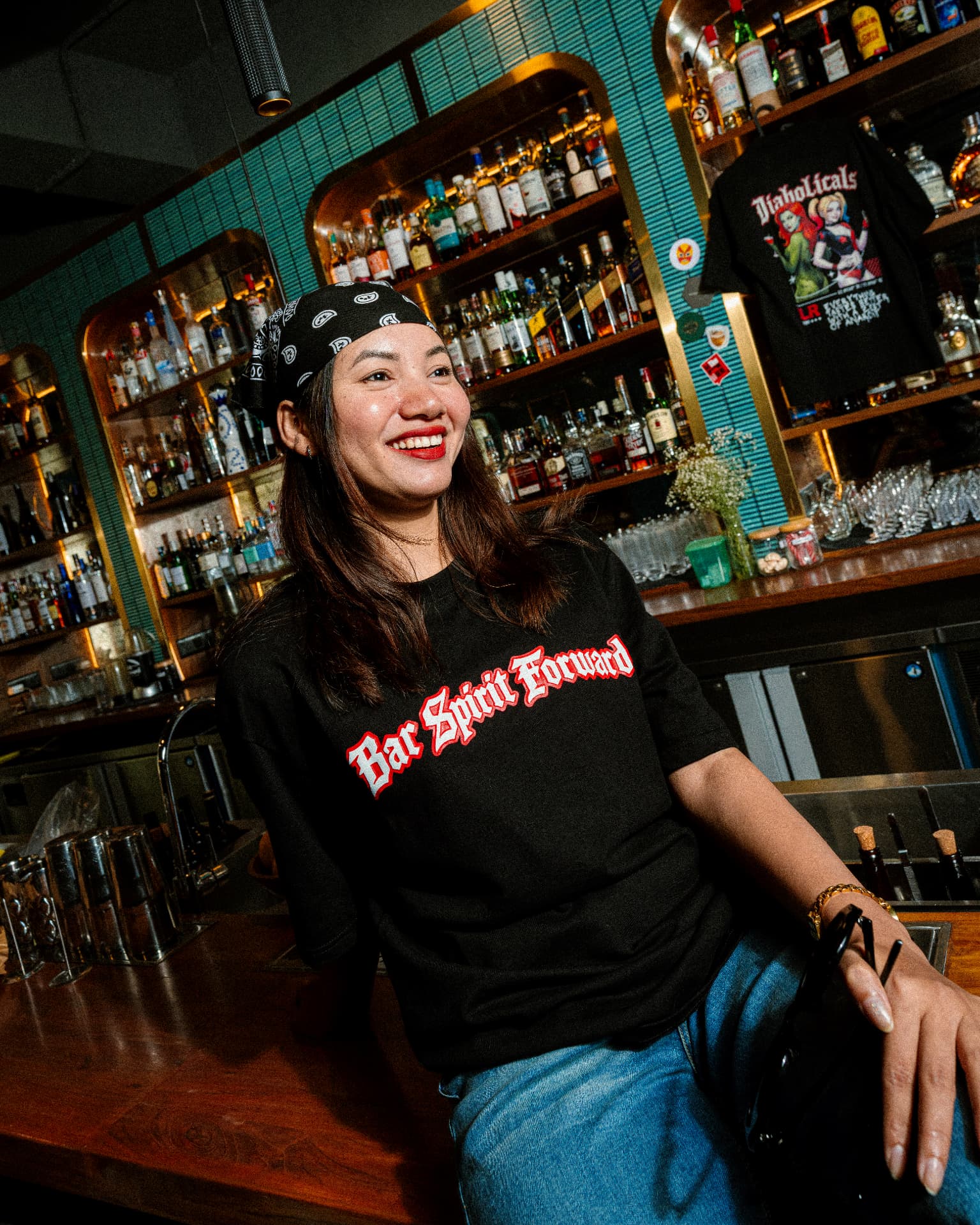 Bar Spirit Forward tee worn behind the bar